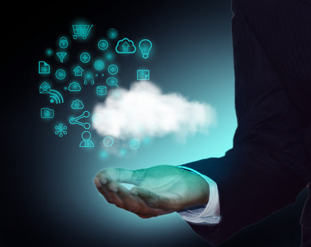 Concept of Cloud computing, Business man demonstrating cloud application development with icon collection