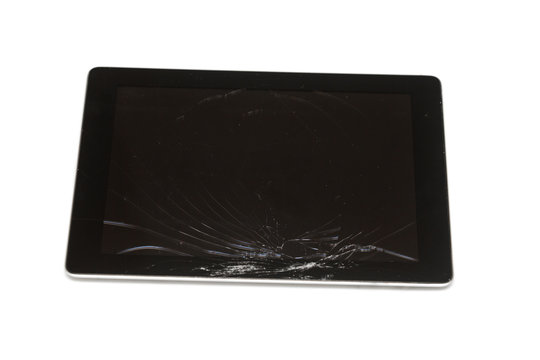 black broken tablet on white background