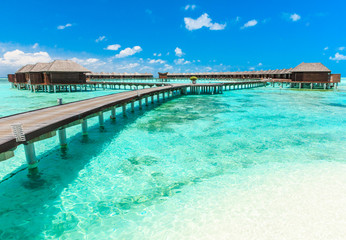 Fototapeta na wymiar beach with water bungalows Maldives