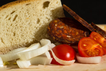 hungarian breakfast with home made kolbasz, tomato, onion and br