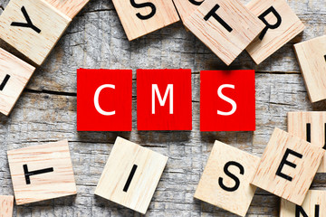 Wooden letters spelling CMS