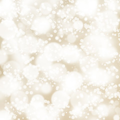 Lights on beige background, sparkles.