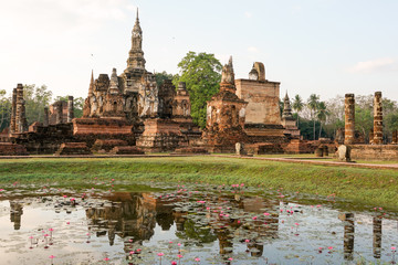 Fototapeta na wymiar Reflection Wat Mahathat Buddhist temple Sukothai world heritage