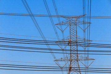 Electricity tower and electric line, power line in blue sky background