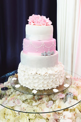 beautiful gorgeous luxury wedding colorful cake in a restaurant,