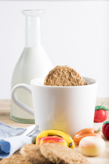 Breakfast with fresh milk, biscuits and candy during the winter cold