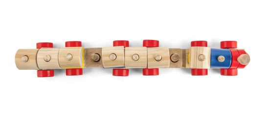 Wooden toy train up view with colorful blocs isolated over white