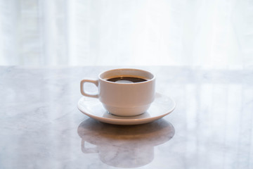 coffee cup on mable table