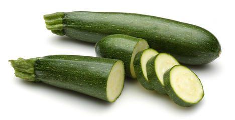 Fresh zucchini and sliced zucchini