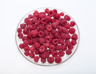 A beautiful selection of freshly picked ripe red raspberries.