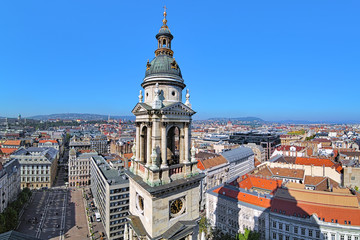 Fototapeta na wymiar Panoramic view of Budapest from the dome of St. Stephen's Basilica with the bell tower in the foreground, Hungary
