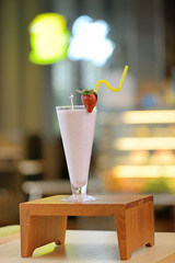 Smoothie made with strawberries in a cafe
