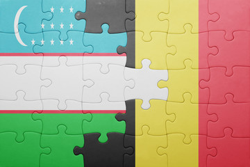puzzle with the national flag of uzbekistan and belgium