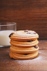 cookies with powdered sugar on a dark background