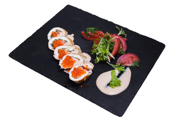 Stuffed chicken fillet with red caviar, isolated on white