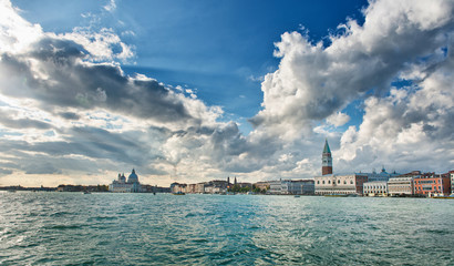 Naklejka premium Dramatic clouds above a Venice cityscape