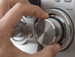 Hand adjusting volume control