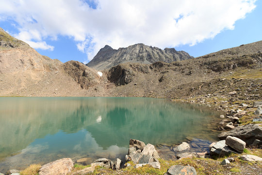 Panorama with lake Eissee and mountain Gro&szlig;er Hexenkopf in Hohe Tauern Alps, Austria