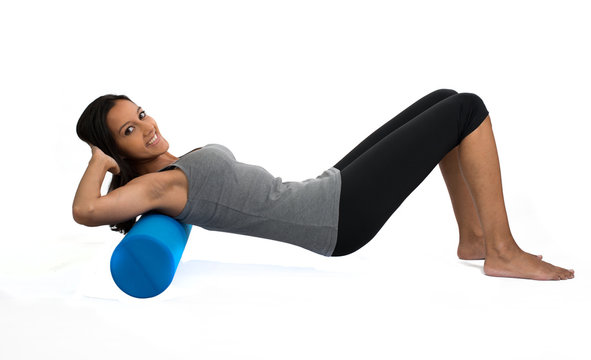 Woman Doing Ab Crunches in White Studio