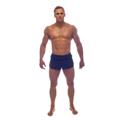 Fototapeta na wymiar muscle man posing in studio