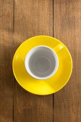 empty ceramic cup on wood