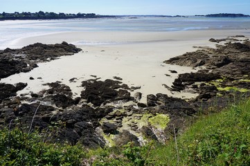 Fototapeta na wymiar The seaside beach resort town of Lancieux on the Atlantic Ocean on the northern coast of Brittany in the Cotes d Armor in France