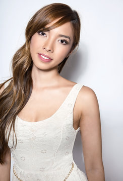 beautiful young asian woman with flawless skin and perfect make-up