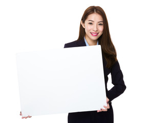 Naklejka premium Asian Businesswoman show with blank white banner