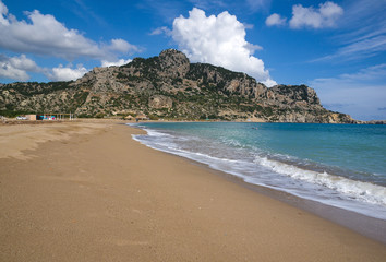 Tsambika (or Tsampika) is one of the most beautiful beaches on Rhodes. A long, broad beach with fine, golden sand. Very crowded at summer period.  Rhodes  Island, Greece.