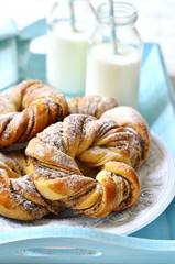Cinnamon buns with milk.