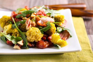 Salad: broccoli, smoked meat, nuts and rocket