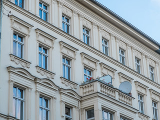 Building with Classic Details and Balcony