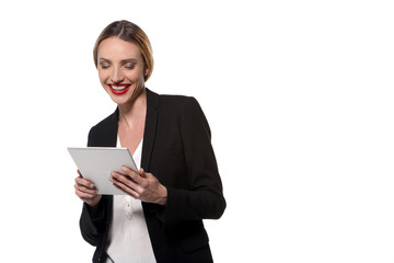 Woman using a tablet isolated on white