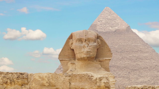 Clouds over the pyramid of Cheops and Sphinx. Giza Egypt. (Time lapse. Animation. Montage)