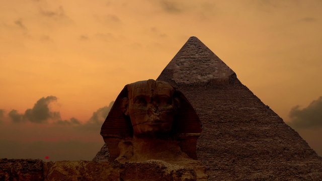 Sunrise over the pyramid of Cheops and Sphinx. Giza Egypt. (Time lapse. Animation. Montage)