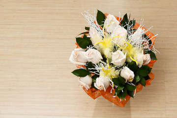 Bouquet of white roses on the floor