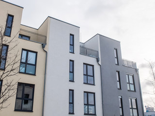 Modern Townhouses Under Overcast Sky