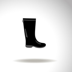 Rubber boots vector icon.