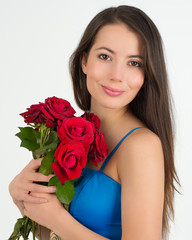 Woman holding a red rose