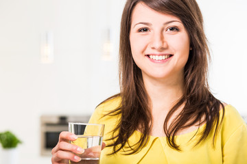 Woman with glass of water