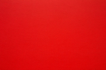 Red leather background.