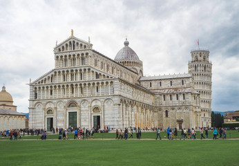 Fototapeta na wymiar View of cathedral and The Leaning Tower of Pisa, Italy,A Cloudy