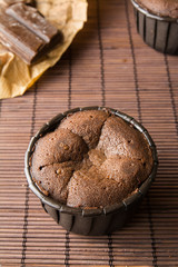  two coulant cakes on brown bamboo
