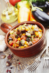 Steamed vegetables in a glass jar