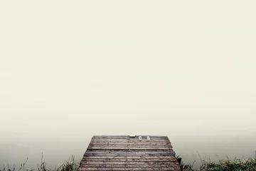 Fotobehang Pier foggy lake perspective © Creaturart