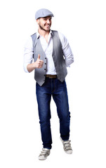 Young handsome man posing and giving a thumb up isolated on white background