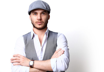 Happy young man. Portrait of handsome young man in casual shirt  smiling while standing against white background