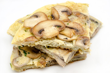 Delicious omelet with mushrooms on white background