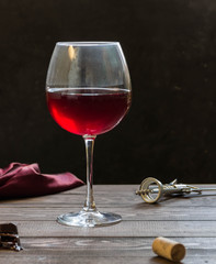 Red wine glasses and chocolates 