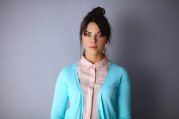 Portrait of an attractive fashionable young brunette woman